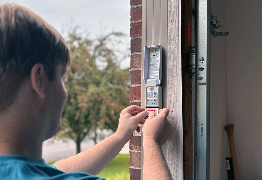 Programming garage opener, key pads and syncing tech devices.